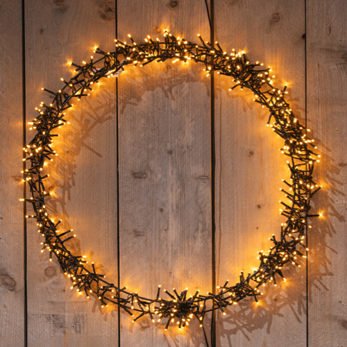 Verlichte kerstkrans ring 68 cm met 600 led lampjes warm wit - maat L